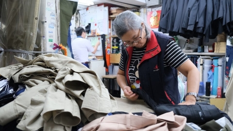 不被成衣打敗 日新西服堅持手作